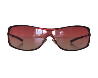 Extē - Archive zonnebril met rood montuur