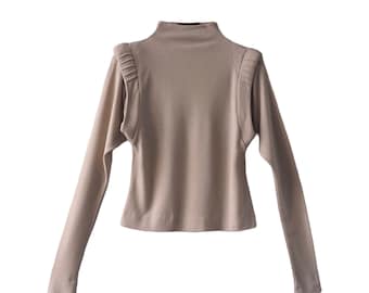 ANNA MOLINARI - Jersey beige de cuello alto con hombreras adornadas