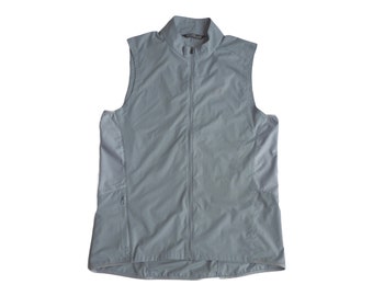 ARC'TERYX - Chaleco deportivo azul grisáceo Incendo con detalles reflectantes