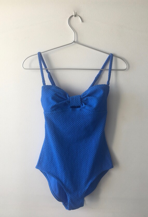 bright blue bodysuit