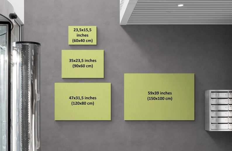 May include: Four different sizes of yellow canvas prints with dimensions listed in inches and centimeters. The prints are hanging on a gray wall.