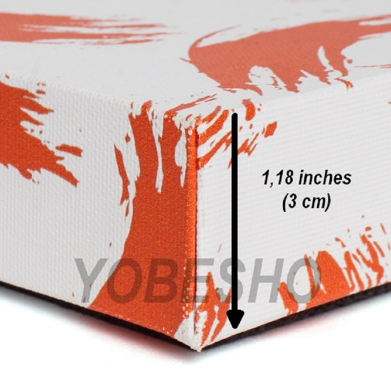 K&ouml;nnte beinhalten: Nahaufnahme der Kante einer wei&szlig;en Leinwand mit orangefarbenen Farbstichen. Die Leinwand ist 1,18 Zoll (3 cm) dick.