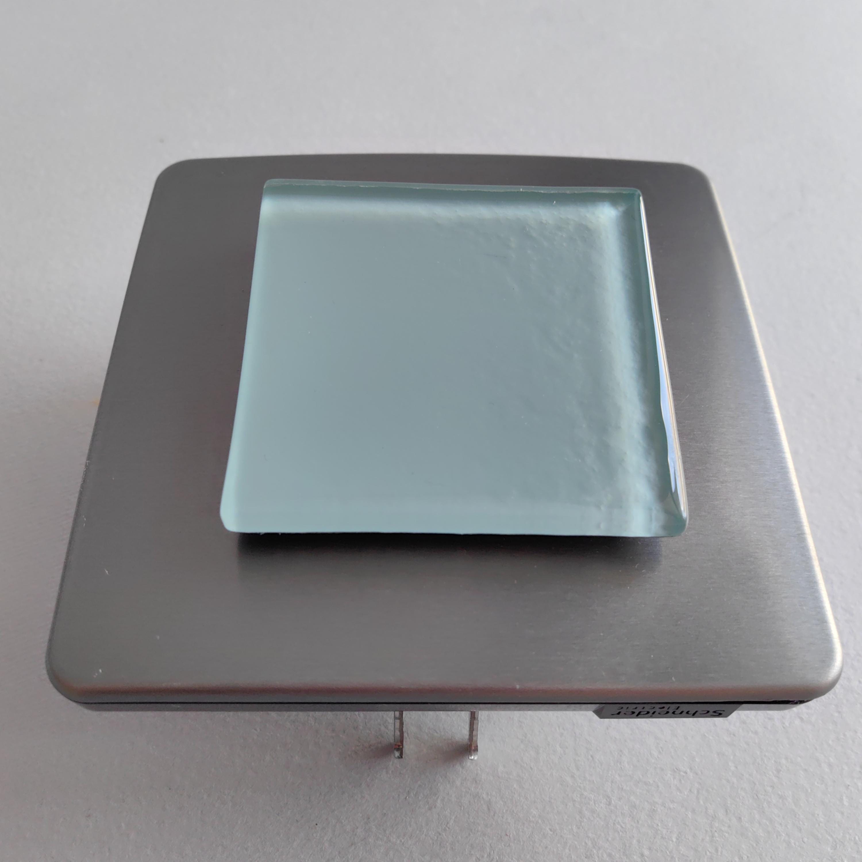 Chinchilla Grey Glass Light Switch With Metal Frame. Modern