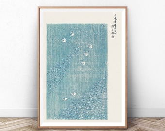 May include: A framed print of a Japanese woodblock print depicting a blue and white landscape with birds flying over a mountain range. The print is titled "青嵐 海上 水中" in Japanese characters.