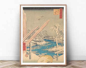 May include: A vintage Japanese woodblock print depicting a snowy landscape with a river, trees, and a bridge. The print is framed in a light wood frame.