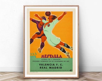 May include: A vintage poster advertising a football match between Valencia F.C. and Real Madrid at the Mestalla stadium in Valencia, Spain. The poster features two players in mid-air, one attempting to head the ball. The poster is set against a bright orange background with the text "Mestalla Futbol de 1. Division Proximo Domingo 20 de Diciembre de 1931 Valencia F.C. Real Madrid" in black and red.