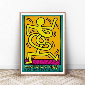 K&ouml;nnte beinhalten: Eine gelbe Strichm&auml;nnchenfigur tanzt auf einem leuchtend orangenen Hintergrund mit einem pink-schwarzen Tupfenmuster am unteren Rand. Das Poster lautet "MONTREUX 1983 17&egrave;me FESTIVAL DE JAZZ-JUILLET 8-24"