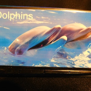 Elongated / Pressed Penny Souvenir Book / Album .. Dolphins