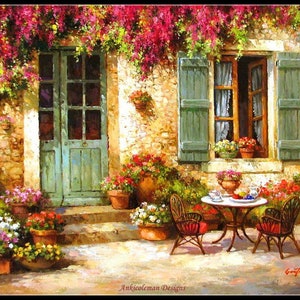 May include: A painting of a stone house with a green door and a window with green shutters. The house is covered in pink flowers and there is a table and chairs on the patio.