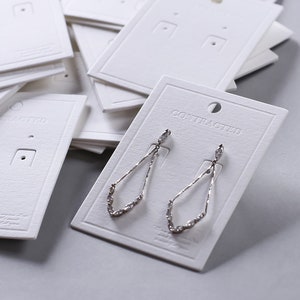 500 piezas de tarjetas de exhibición de pendientes personalizadas, tarjetas de pendientes de 5x7 cm, tarjetas de joyería personalizadas, soportes de pendientes blancos puros, tarjetas de pendientes colgantes