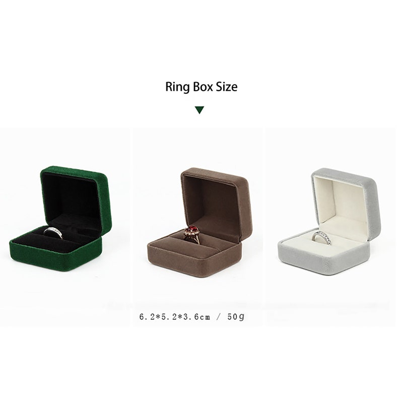 May include: Three ring boxes in different colors: green, brown, and gray. Each box has a velvet interior and is designed to hold a ring. The boxes are 6.2 x 5.2 x 3.6 cm and weigh 50 grams.