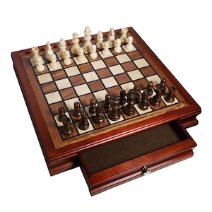 May include: A wooden chess set with a dark brown frame and a drawer. The chessboard features a light and dark square pattern. The chess pieces are in two colors: light and dark brown. The drawer is open, revealing a felt-lined interior.