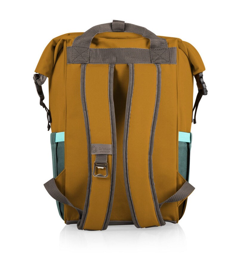 May include: Mustard-coloured backpack with grey straps and accents. Features a teal side pocket and a built-in bottle opener. The backpack has a top handle and adjustable shoulder straps. The brand logo is visible on the back.