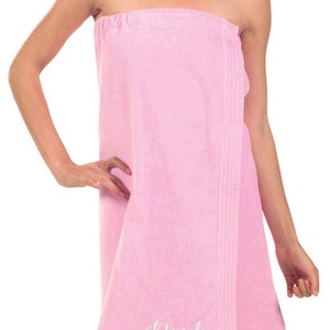 May include: Pink spa wrap with the word "Bride" embroidered in silver thread.