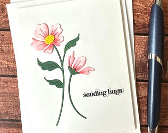 Tarjeta de felicitación con abrazos, tarjeta de cumpleaños hecha a mano, papel tapiz en blanco por dentro.