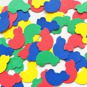 May include: Assortment of colorful felt shapes, including cars, hearts, and other abstract shapes. The shapes are cut from felt and are perfect for crafting projects.
