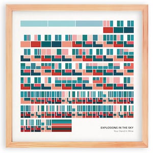 May include: A framed print with a geometric pattern in shades of teal, pink, red, and white. The print has the text "Explosions in the Sky" and "Your Hand in Mine" at the bottom.