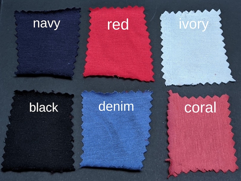 Puede incluir: Seis muestras de tela en diferentes colores: azul marino, rojo, marfil, negro, mezclilla y coral.