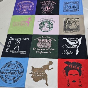 May include: A quilt made of 10 different t-shirts, each with a unique design and text. The designs include a ballerina, a princess, a swan, a sleeping beauty, and a Frida Kahlo portrait. The text includes "Downtown Dance Conservatory", "The Nutcracker Princess", "Zelda", "Tutu", "Swan Lake", "Princess of the Highlands", "Noccalula's Fall", "Sisters Grimm", and "Frida!"