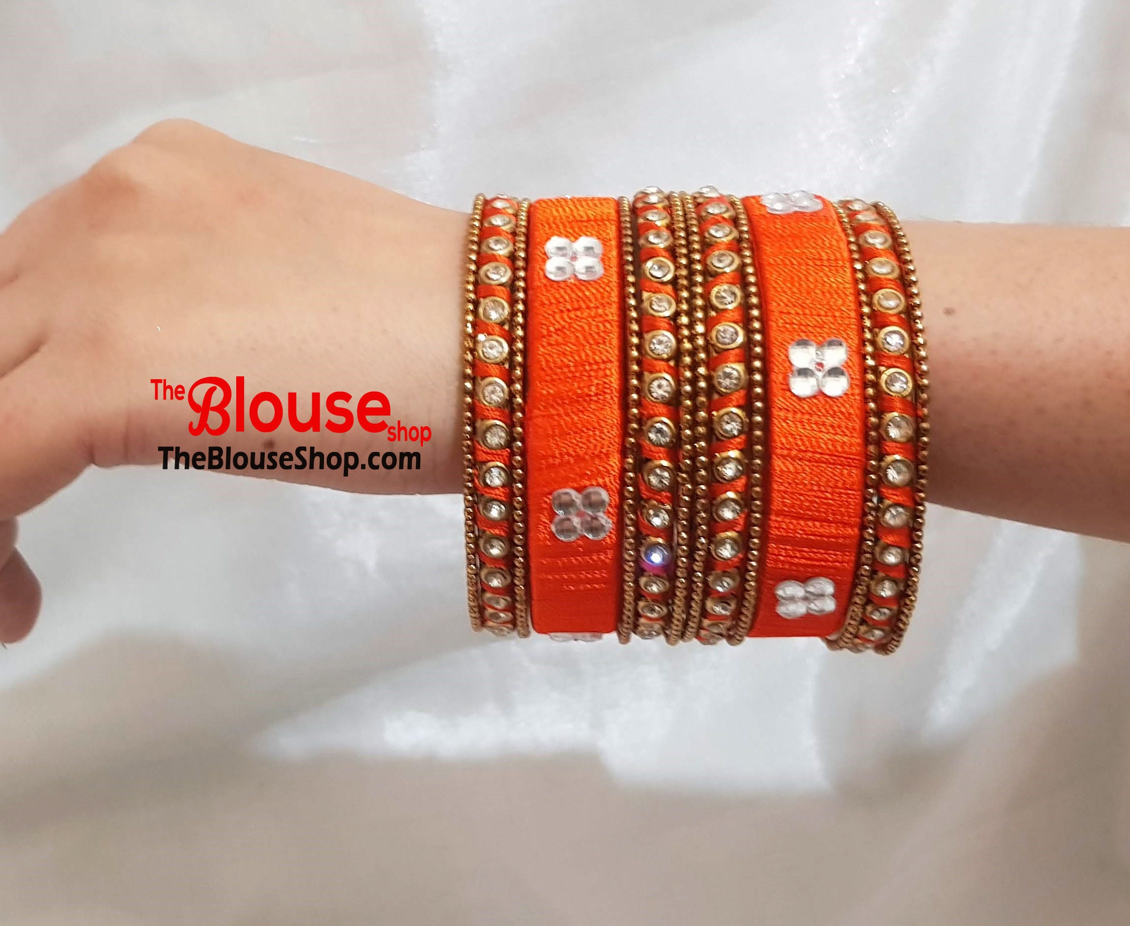 Orange colour thread bangles discount