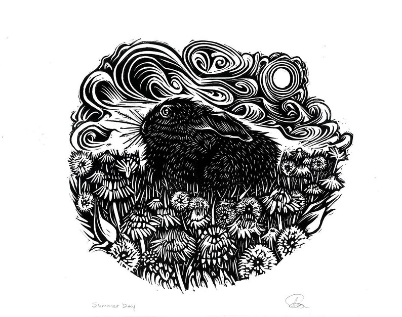 May include: Black and white linocut print of a rabbit in a field of flowers with a moon and clouds in the background. The print is titled "Summer Day".
