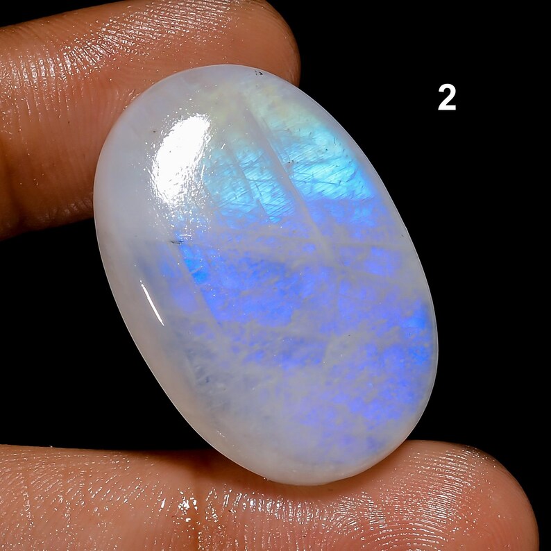 Tutte le forme miste, pietra preziosa di pietra di luna arcobaleno, cabochon di pietra di luna blu fuoco, cristalli di pietra di luna arcobaleno bianca naturale e retro piatto lucidati a mano. 2. 31X21X6mm 39Crt