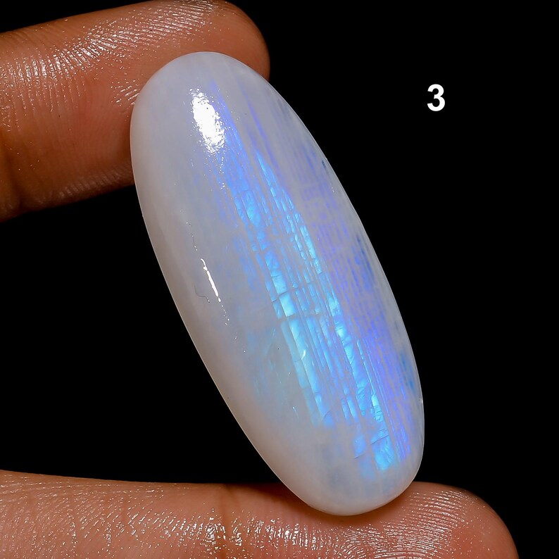 Tutte le forme miste, pietra preziosa di pietra di luna arcobaleno, cabochon di pietra di luna blu fuoco, cristalli di pietra di luna arcobaleno bianca naturale e retro piatto lucidati a mano. 3. 39X16X7mm 46Crt