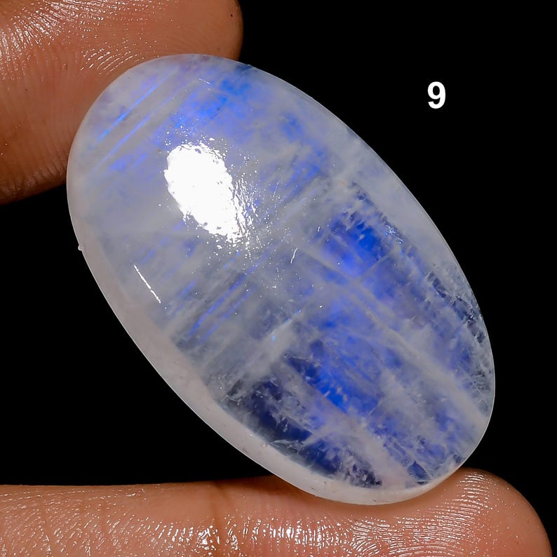 Tutte le forme miste, pietra preziosa di pietra di luna arcobaleno, cabochon di pietra di luna blu fuoco, cristalli di pietra di luna arcobaleno bianca naturale e retro piatto lucidati a mano. 9. 37X23X7mm 56Crt