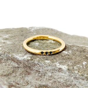 Black diamond ring. Three stone ring. Solid gold