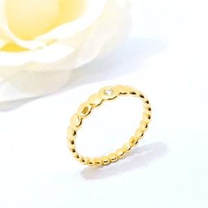 perles or jaune bague de diamant