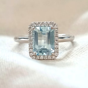 Emerald cut Aquamarine engagement ring in 18k white Gold, Diamond halo ring