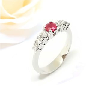 ruby and diamond band in 18k gold.