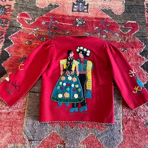 This listing is for a Child’s Vintage 1950s Red Mexican Tourist/Souvenir Embroidered Jacket