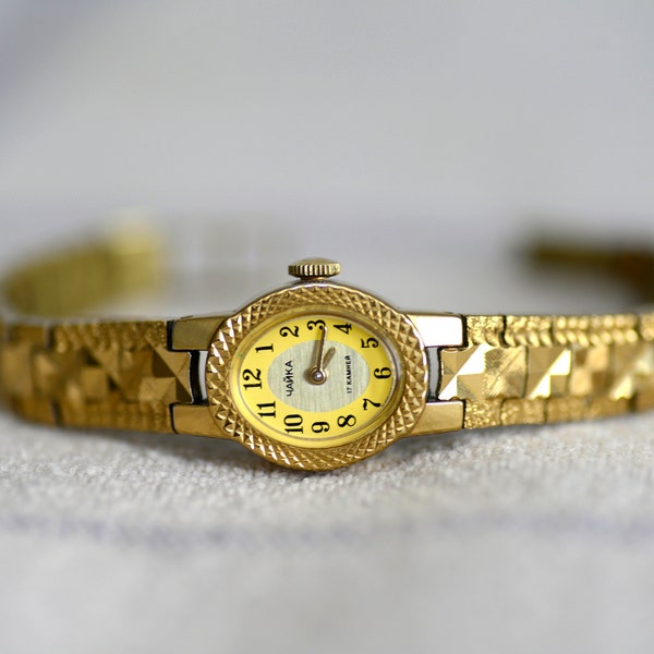 Women's wrist watch with a gold tone bracelet.Chayka women's watch oval dial evening watch. Cocktail watch as a gift