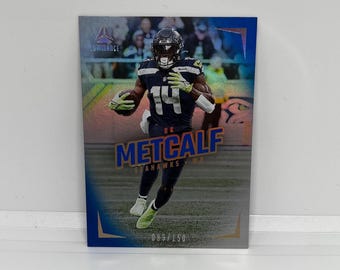DK Metcalf #68Seattle Seahawks; Blaue Parallele - Nummeriert 089/150; Panini Luminance Fussball 2024