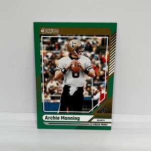 Archie Manning # 195 Saints de la Nouvelle-Orléans ; Epreuve de presse verte ; Ballon de football Panini Donruss 2024