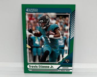 Travis Etienne Jr #207 Jacksonville Jaguars; Prueba de prensa verde; Panini Donruss Football 2024