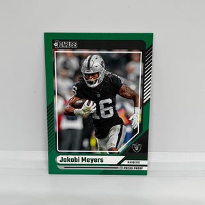 Jakobi Meyers #84 Las Vegas Raiders; Prova de imprensa verde; Panini Donruss Football 2024