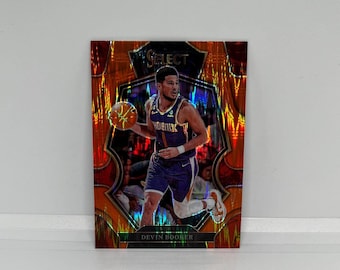 Devin Booker #138 Phoenix Suns; Livello Premier - Orange Flash Prizm; Panini Select Basketball 2023