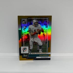 Dan Marino #130 Miami Delfine; Gold Press Proof; Panini Donruss Fußball 2022