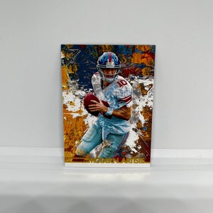 Eli Manning # MA25, Giants de New York ; Galerie Topps - Artistes modernes ; Topps composite de football 2024