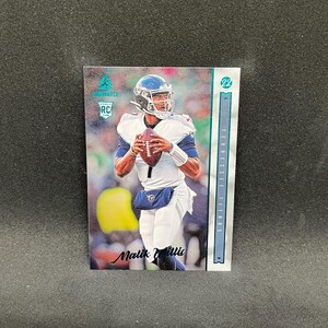May include: A football trading card featuring Malik Willis of the Tennessee Titans. The card has a teal and silver border with the text "Tennessee Titans" and "RC". The player is wearing a white and blue uniform and holding a football.