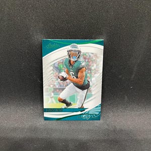 May include: A set of three ceramic mugs with a speckled, matte finish. The mugs are in shades of cream, light gray, and dark gray. Each mug has a simple, minimalist design, perfect for coffee or tea.