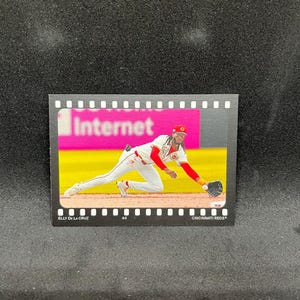 May include: A set of three ceramic mugs with a speckled, matte finish. The mugs are in shades of cream, light gray, and dark gray. Each mug has a simple, minimalist design, perfect for coffee or tea.