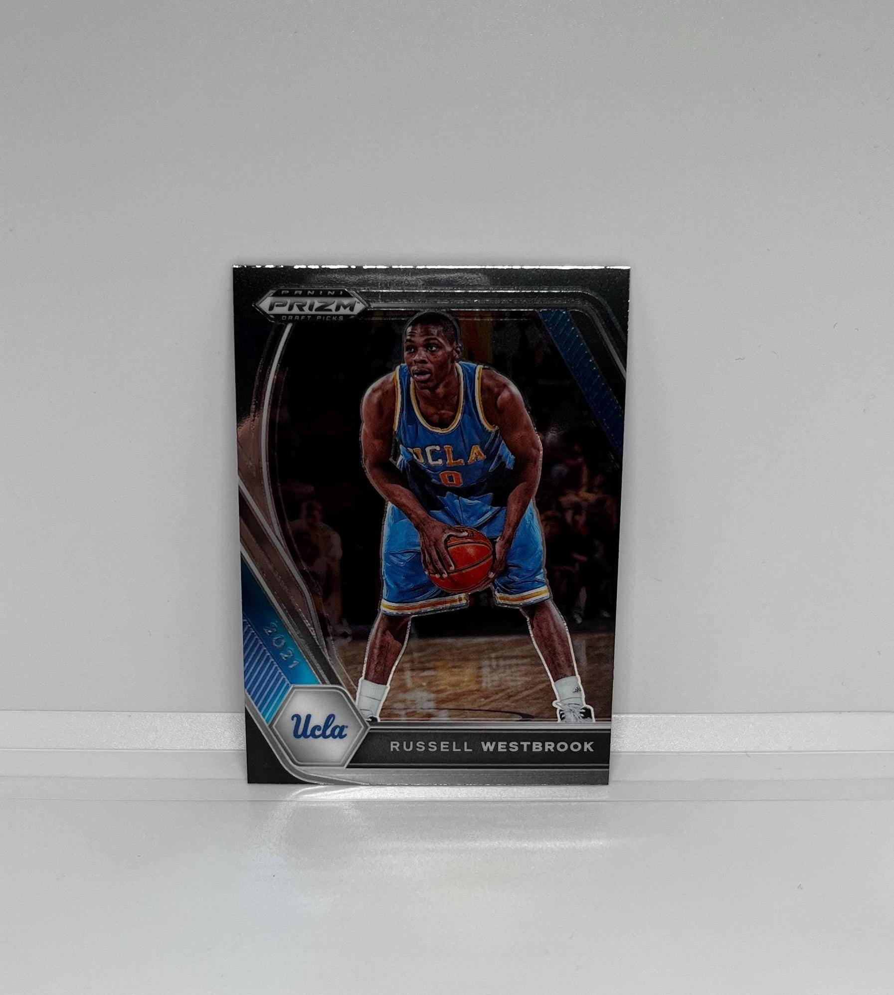 Russell Westbrook #54 Denver Nuggets; Uniforme da faculdade; Panini Prizm Draft Picks Basquete 2021