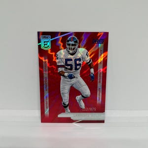 Lawrence Taylor #96 Giants de New York ; Rouge scintillant Aspirations - Numéroté 112/875 ; Ballon de football Panini Donruss Elite 2024