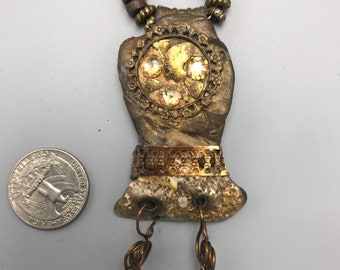 Abalone and Resin with Repurposed metal pieces and Swarovski Crystals