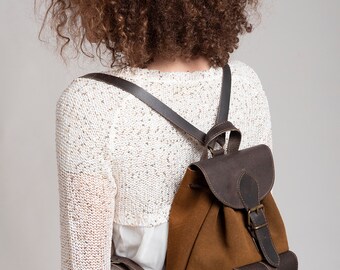 black leather gucci backpack GUCCI GG Emblem Medium Backpack, Black, Leather