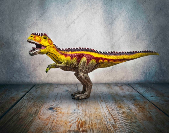 yellow t rex toy