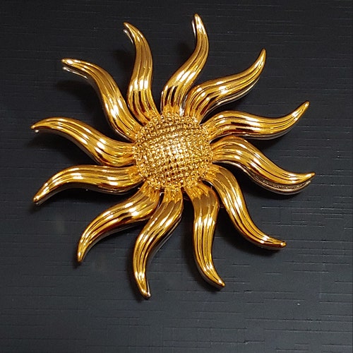 KJL ROTATING FLOWER retailer Pin - Kenneth J Lane convertible sunflower pin that rotates with alternate crystal petals, converts from pin to pendant